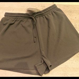 Large black vacation/ summer or everyday wear cool confident very stretchy fit